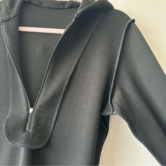 Untouched World Long Hooded Pullover in black - Picture 10 of 13